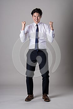 East Asian businessman shooting studio portrait photo