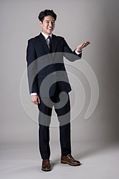 East Asian businessman shooting studio portrait photo