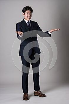 East Asian businessman shooting studio portrait photo