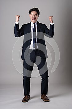 East Asian businessman shooting studio portrait photo