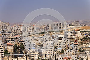 East Jerusalem suburb and a West Bank town