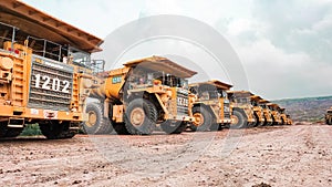 East Kalimantan, January 22,2021 Yellow troop heavy equipment trucks lined up