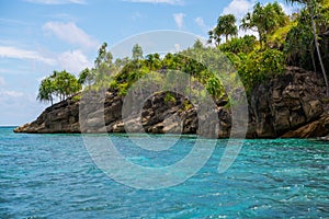East Misool, group of small island in shallow blue lagoon water