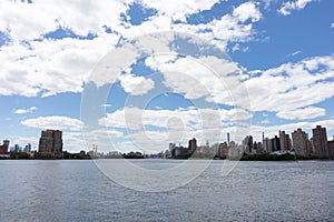 East River in New York City between the Manhattan and Astoria Queens Skylines