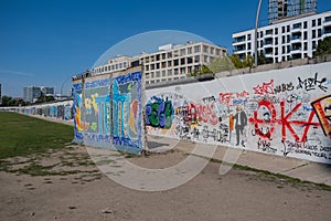 East Side Gallery, Berlin Wallin in front of modern buildings, Berlin, Germany