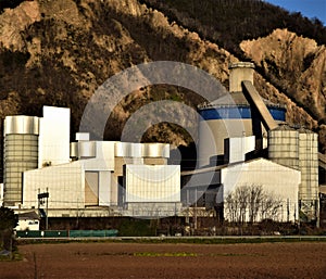 East side of the Monselice SPA cement plant, illuminated by the sun, photographed on a winter morning.