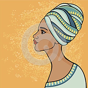 East suntanned girl in a traditional turban. Profile view.