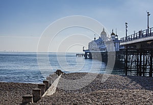 Eastbourne, East Sussex, England - the pier and blue waters of the sea.
