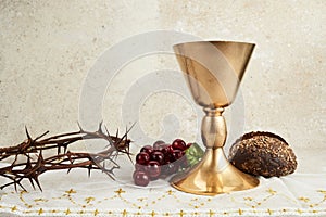 Easter background with crown of thorns and Chalice with red wine as concept for Christ blood