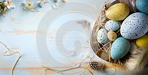 Easter background with Easter eggs and spring flowers. Top view