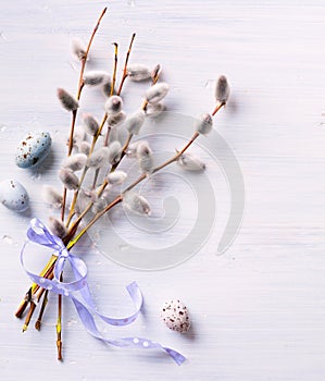 Easter background with Easter eggs and spring flowers. Top view