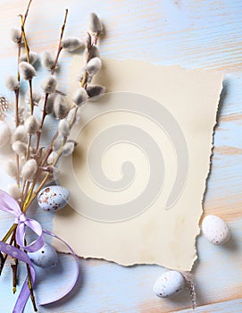 Easter background with Easter eggs and spring flowers. Top view