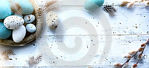 Easter background with Easter eggs on white table