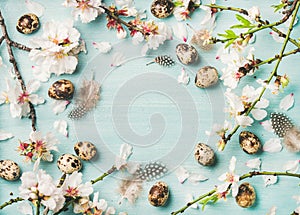 Easter background with eggs and Spring almond blossom flowers