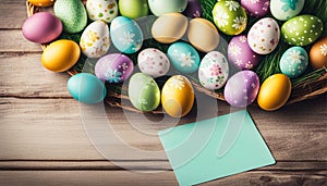Easter background with hand painted eggs and empty card with copy space for text