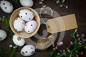 Easter background.Happy easter eggs pained on wood bask