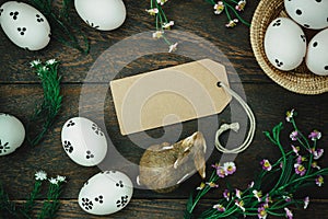 Easter background.Happy easter eggs pained on wood bask photo