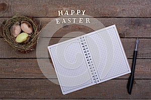 Easter background. The inscription of the wooden letters `Happy Easter`.