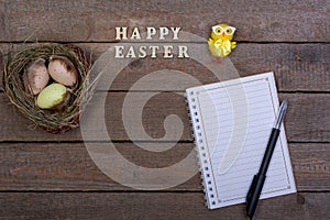 Easter background. The inscription of the wooden letters `Happy Easter`