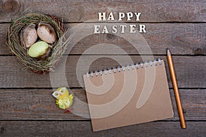 Easter background. The inscription of the wooden letters `Happy Easter`