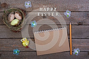 Easter background. The inscription of the wooden letters `Happy Easter`.