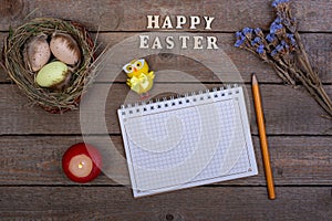 Easter background. The inscription of the wooden letters `Happy Easter`.