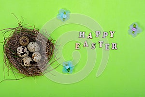 Easter background. The inscription of the wooden letters `Happy Easter`