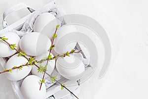 Easter background white eggs green spring twigs