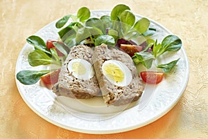 Easter baked meatloaf with boiled eggs
