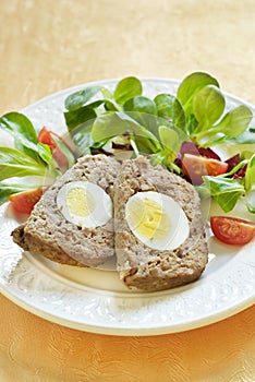 Easter baked meatloaf with boiled eggs