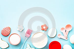 Easter baking background at blue flat lay.