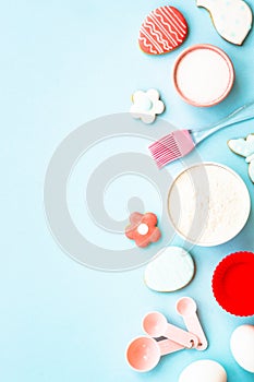 Easter baking background at blue flat lay.