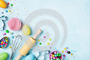 Easter baking background with kitchen tools for holiday sweet bakery top view. Flat lay