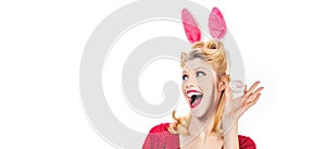 Easter banner with bunny woman. Easter woman. Woman wearing a mask Easter bunny and looks very sensually. Pinup woman in