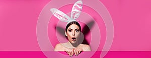 Easter banner with bunny woman. Funny emotions, excited expressing. Bunny woman isolated on pink.