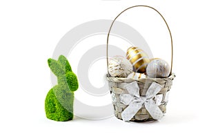 Easter basket eggs and green bunny isolated on white. For greeting card, promotion, poster, flyer, web-banner, article