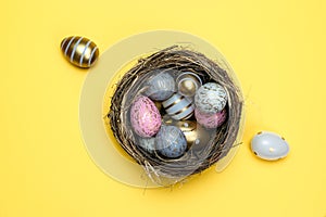 Easter basket eggs isolated on yellow. For greeting card, promotion, poster, flyer, web-banner, article