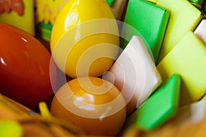 Easter basket with eggs and wrapped sweets