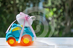 Easter blue cars with a white egg