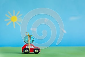 Easter blue egg on red car. Holiday easter concept