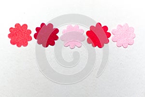 Easter border design on white. Festive background of colored eggs, flowers, birds, leaves, decorated with embroidery