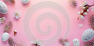 Easter border frame of Easter eggs and spring flowers with copy space in the middle