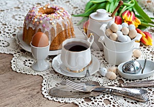Easter breakfast, high tea, table setting for a festive dinners, knitted tablecloth