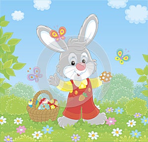 Easter Bunny with a basket of decorated eggs