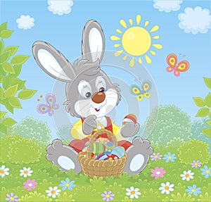 Easter Bunny with a basket of decorated eggs