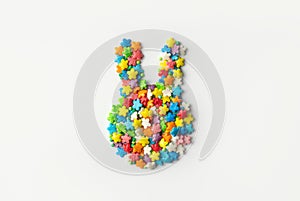 Easter bunny from colorful sprinkles on a light background. Easter concept