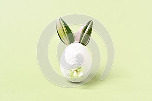 Easter bunny, Easter egg, green leaves and flower, DIY gift idea.