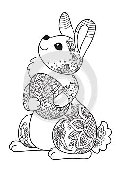 Easter bunny with egg doodle coloring book page. Antistress zentangle coloring book page for adults and children