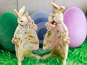 Easter bunny family, crafty egg shape with fairy village on belly,