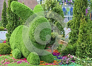 Easter bunny made from green grass using topiary technique